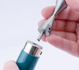Inserting the hourglass mandrel into the Conetastic tool